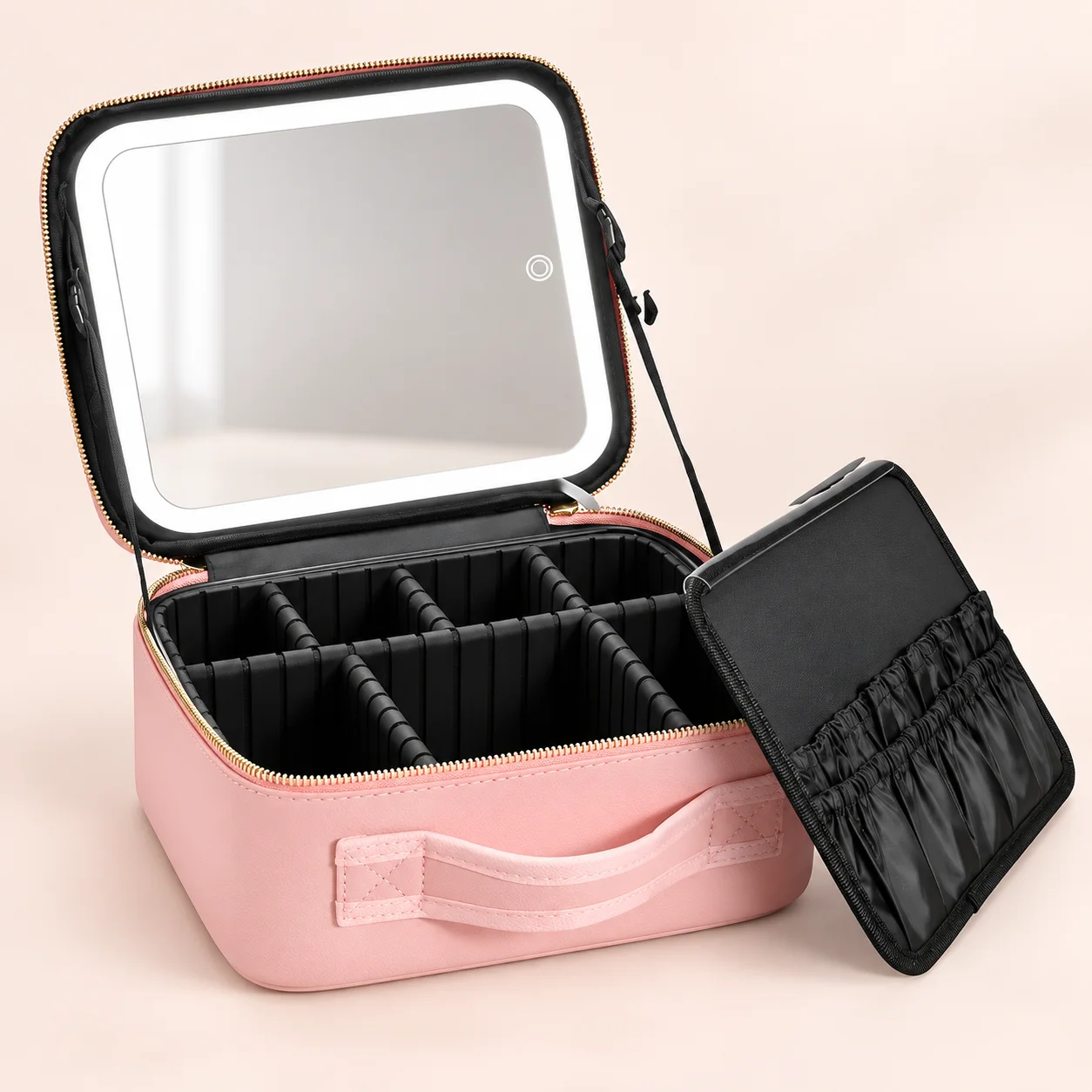 Maleta rosa abierta y panel separado para brochas